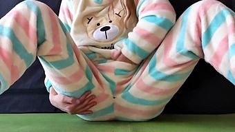 Young Woman In Lounge Wear Pleasures Herself And Experiences A Female Ejaculation